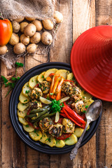 Chermoula fish tajine with bell peppers, moroccan cousine.