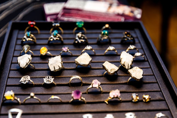 Handmade crystal market, jewelry made of silver, steel, natural stones, beads