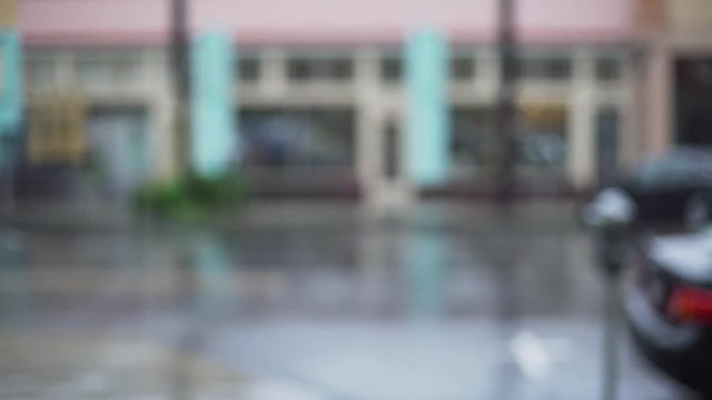 Background Plate of Rainy city street with parking meters and parked cars