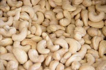 Cashews nut background. kernels of peeled nuts close up