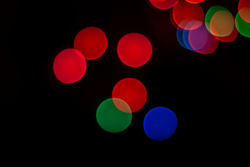 defocused colorful decorative lights at night