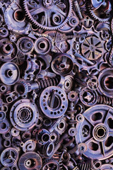 Steampunk background, machine parts, large gears and chains from machines and tractors.