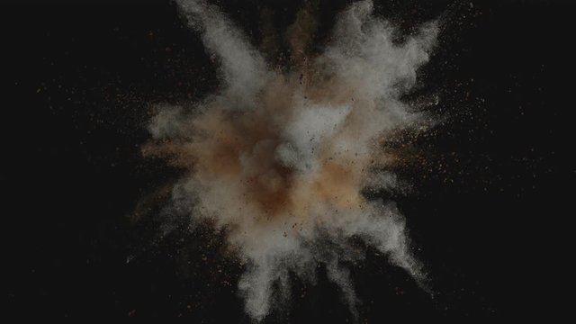 Ultra slowmotion shot of gold and silver powder explosion on black background. Shot with high speed cinema camera at 1000fps
