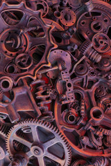 Steampunk background, machine parts, large gears and chains from machines and tractors.