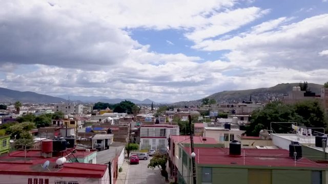 Aerial shot over Oaxaca City in Oaxaca, Mexico on a sunny day.