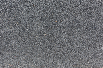 the jet-black asphalt