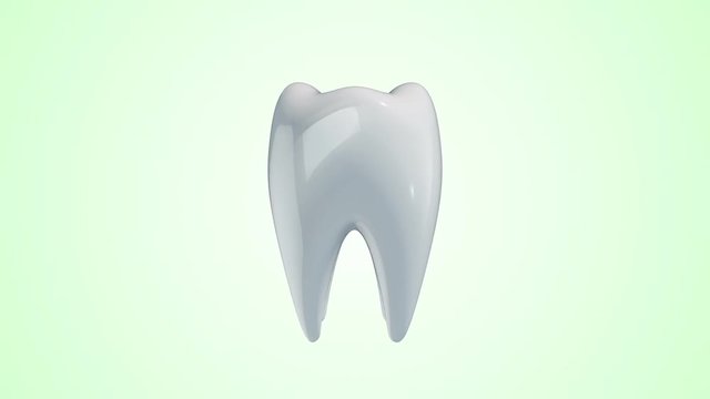 Animation rotation of white tooth with colorful arrows around. Animation of seamless loop.