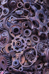 Steampunk background, machine parts, large gears and chains from machines and tractors.