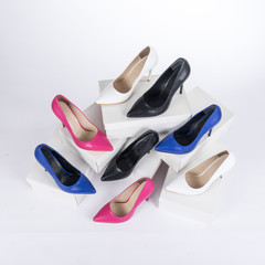 Shoes on boxes. women`s pointed heel stiletto shoes.	