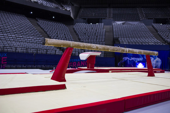 A balance beam in a gymnastic arena 