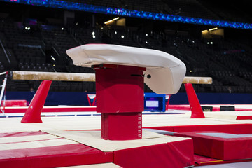 A vaulting horse in a gymnastic arena 