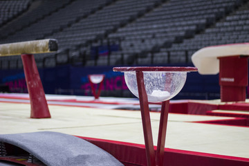 A balance beam in a gymnastic arena 