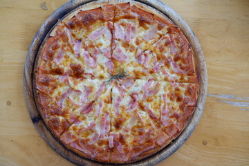 hawaiian pizza on table