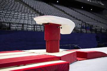 A gymnastic vaulting horse in a gymnastic arena 