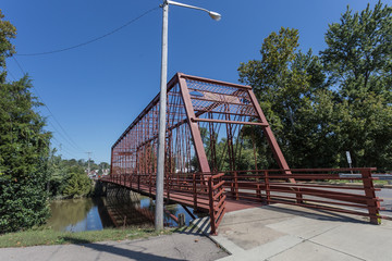 Metal bridge crossing river