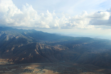 Fototapeta premium Aerial Desert Mountain Landscape in Rainclouds