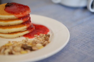 pancake with strawberry jam and copy space