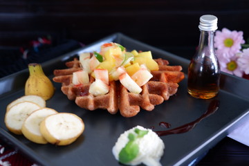 waffle with honey and fruit salad