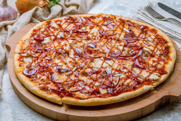 Pizza with meat and barbecue sauce