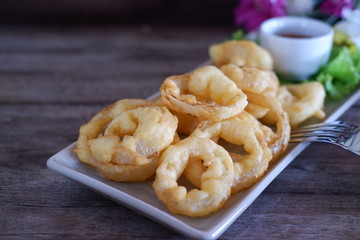onion ring on old wooden