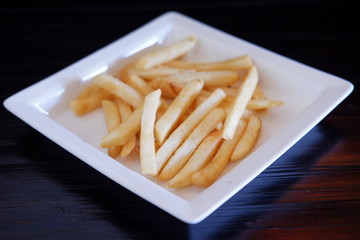 french fries on wood table