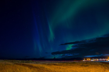 Norhtern lights above port of Hofn in Iceland