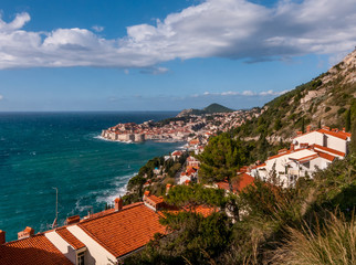 Naklejka na ściany i meble Dubrovnik Croatia with stormy sea around medieval old city