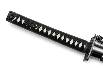 Tsuka handle of Japanese sword  isolated in white background. White rayskin and black leather cord.