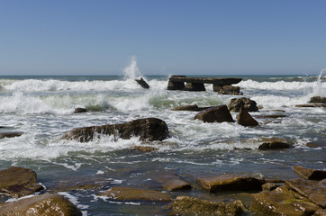 broken pier punished by the waves