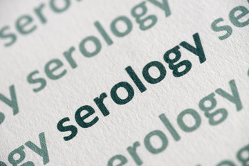 word serology printed on  paper macro
