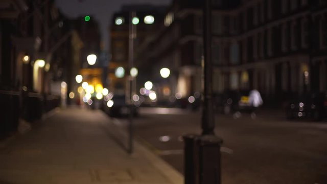 Blurred shot of quiet urban street in London, people tucked in for the night