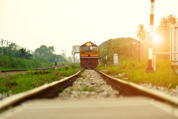 Low angle photo Front of old train led with Diesel Electric locomotives on the tracks of Thailand