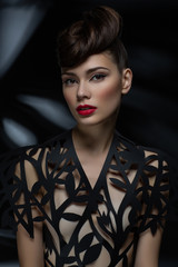 beautiful young woman with fancy hairdo and red lips