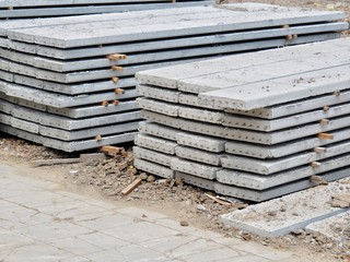 Prestressed Floor planks stacked for construction. It is a slab of reinforced concrete. Put...