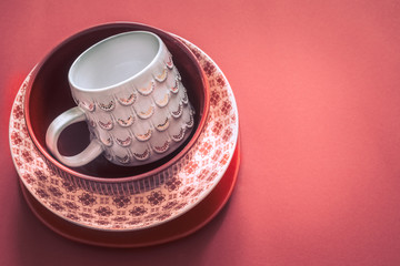 Beautiful handmade cookware on a colored background