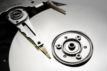 Close up of hard disk's internal mechanism hardware