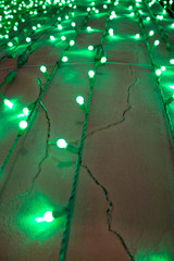 Green Colored Christmas Light On Wall
