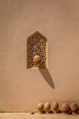 Ceramic pottery outside Bahla Fort in the Hajjar Mountains, Oman.