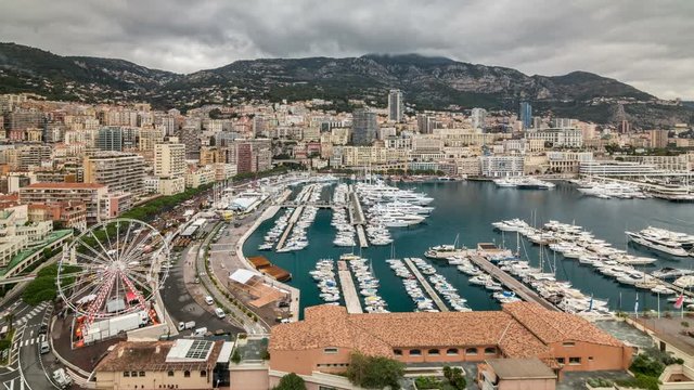 The Port Hercule in Monte Carlo, Monaco. Panoramic view. Cloudy sky. Time lapse video. 