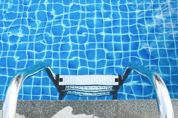 sunshine on swimming pool © Win Nondakowit