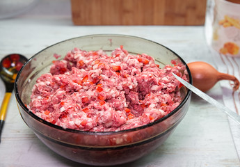 Minced beef and pork in bowl. Homemade food.