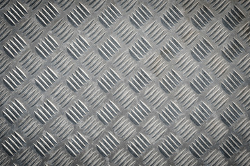 Metal floor plate with diamond pattern texture
