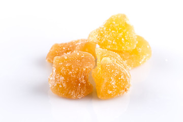 heap of sweat Candied ginger isolated on white