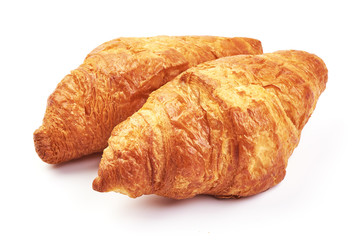 Traditional croissants, close-up, isolated on a white background.