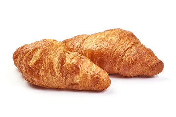 Traditional croissants, close-up, isolated on a white background.