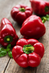 Plate with Bell peppers on a wooden background