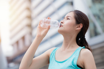 healthy sport cute asian teen drinking water city background