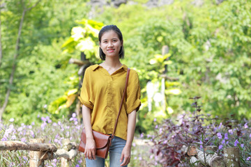 woman in flower garden in Vietnam