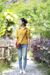 woman in flower garden in Vietnam