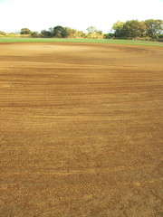 Obraz premium 秋の河川敷のグラウンド風景